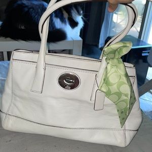 Coach bag with green tie